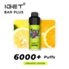 Image of an IGET BAR PLUS 6000 PUFFS - Orange Lemon vape device in front of an orange and lemon. Text on the image reads "IGET BAR PLUS 6000 PUFFS - Orange Lemon.