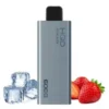 The sleek silver HQD Slick vape device sits beside fresh strawberries and ice cubes, captivating the senses. This "Bundle 5 pcs - Hqd Slick 6000 puffs" promises a refreshing experience.