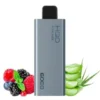 A Bundle of 10 silver-colored HQD Slick Cuvie vape devices, each promising up to 6000 puffs of pleasure, is displayed upright and surrounded by mixed berries and aloe vera leaves.